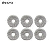 A set of replacement parts for a Dreame robot vacuum cleaner, showing various circular brush components.