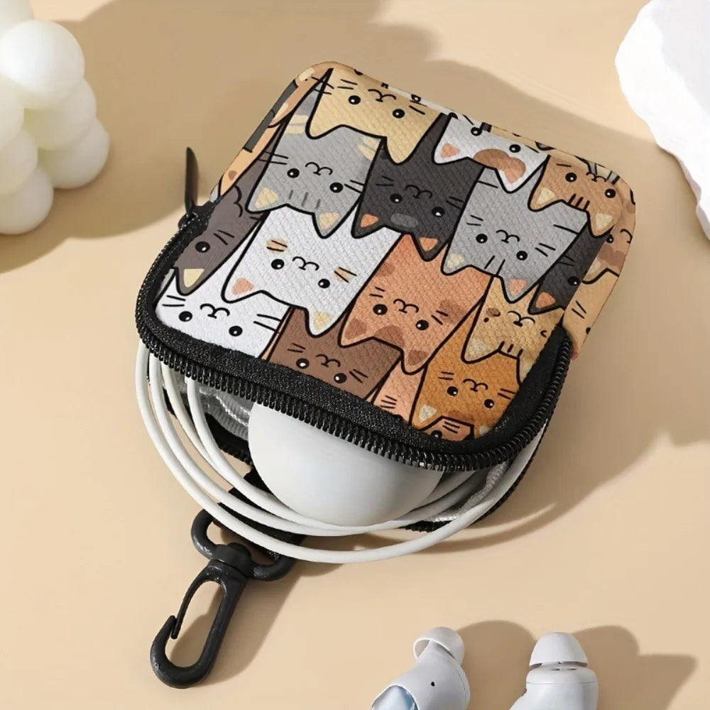 A small coin purse featuring a pattern of cats and dogs in various shades of brown, gray, and white.