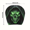 A black cartoon skull design with glowing green eyes on a headrest cover.