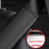 Close-up of a black PU leather embossed seat belt shoulder cushion with a sponge layer.