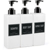 A three-pack of white refillable soap dispenser bottles with black pump tops and labels.