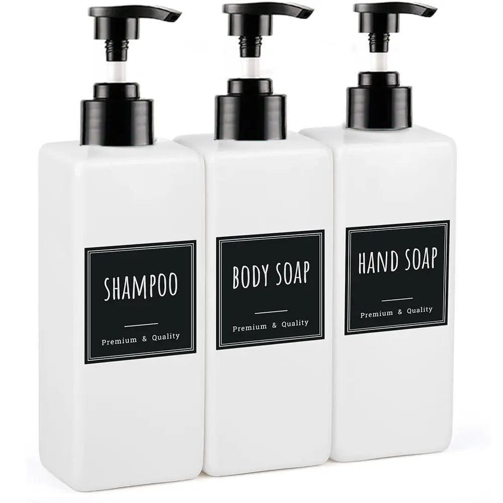 A three-pack of white refillable soap dispenser bottles with black pump tops and labels.