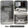 Silver luxury mirror embossed wall panels featuring black and white vertical stripes in a modern interior setting