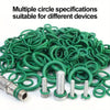 A pile of green O-ring gaskets and various metal spring components for different devices.