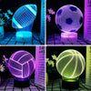 A glowing purple and blue soccer ball 3D illusion night light displayed on a stand.