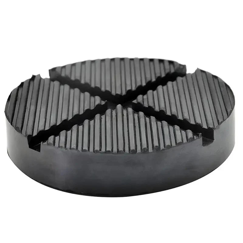 Black rubber jack pad with a textured surface for car pinch welds