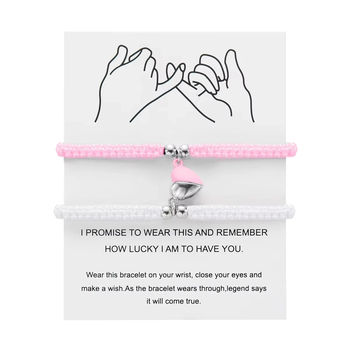 Pink and silver magnetic heart couple bracelets shown with a promise to wear them and remember how lucky they are