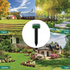 A black solar-powered ultrasonic animal repellent device shown in various outdoor settings including a farm, park, garden, an