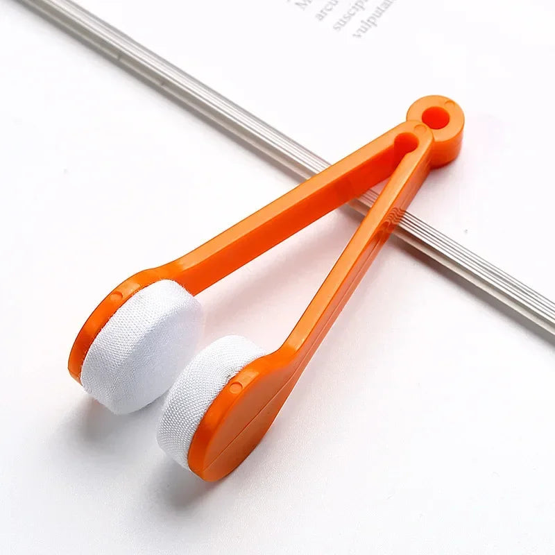 Orange portable double-sided glasses cleaning brush with white microfiber pad