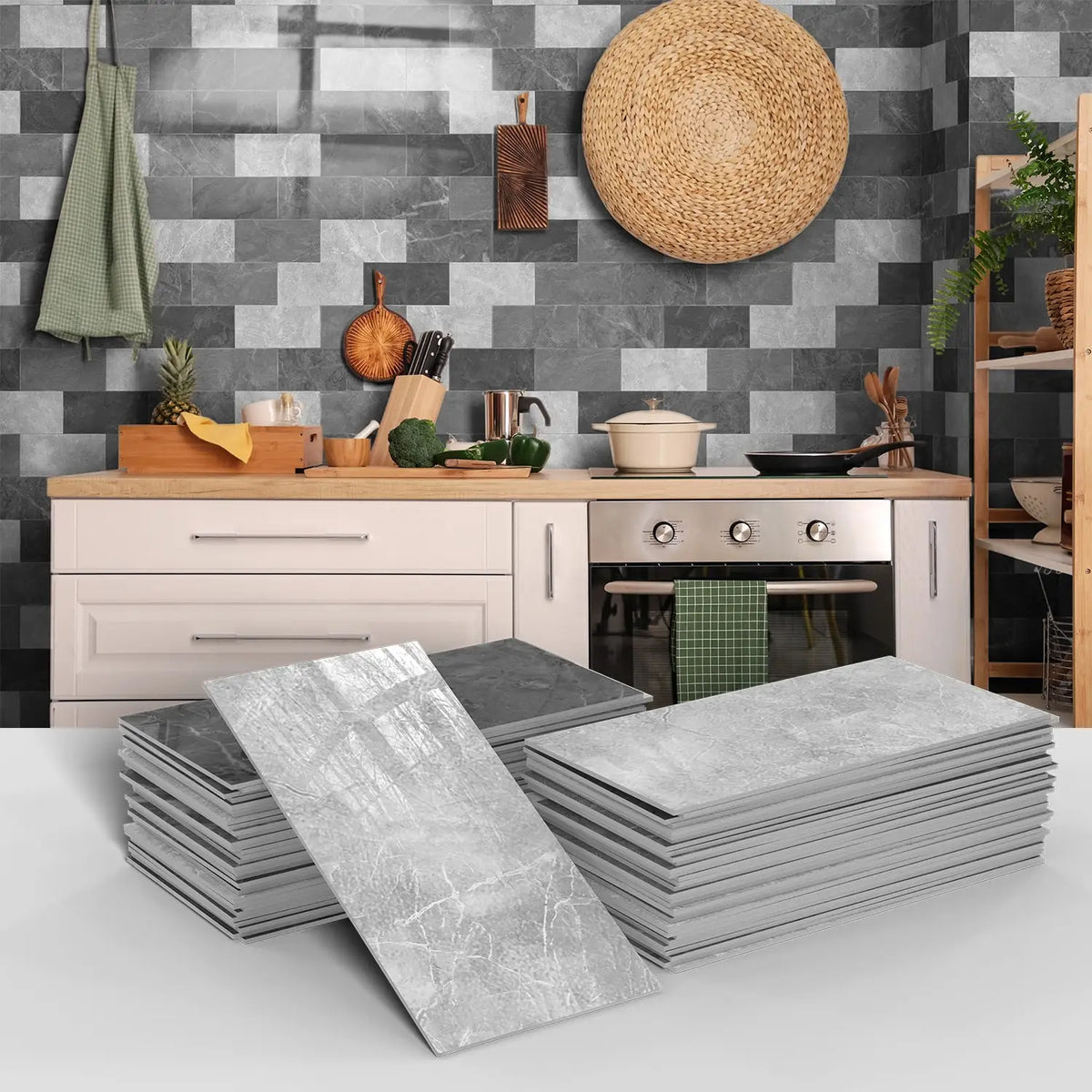 A stack of gray marble self-adhesive wall stickers displayed in front of a kitchen backsplash.