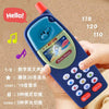 A hand holds a blue kids learning toy smartphone with lighting and music features.