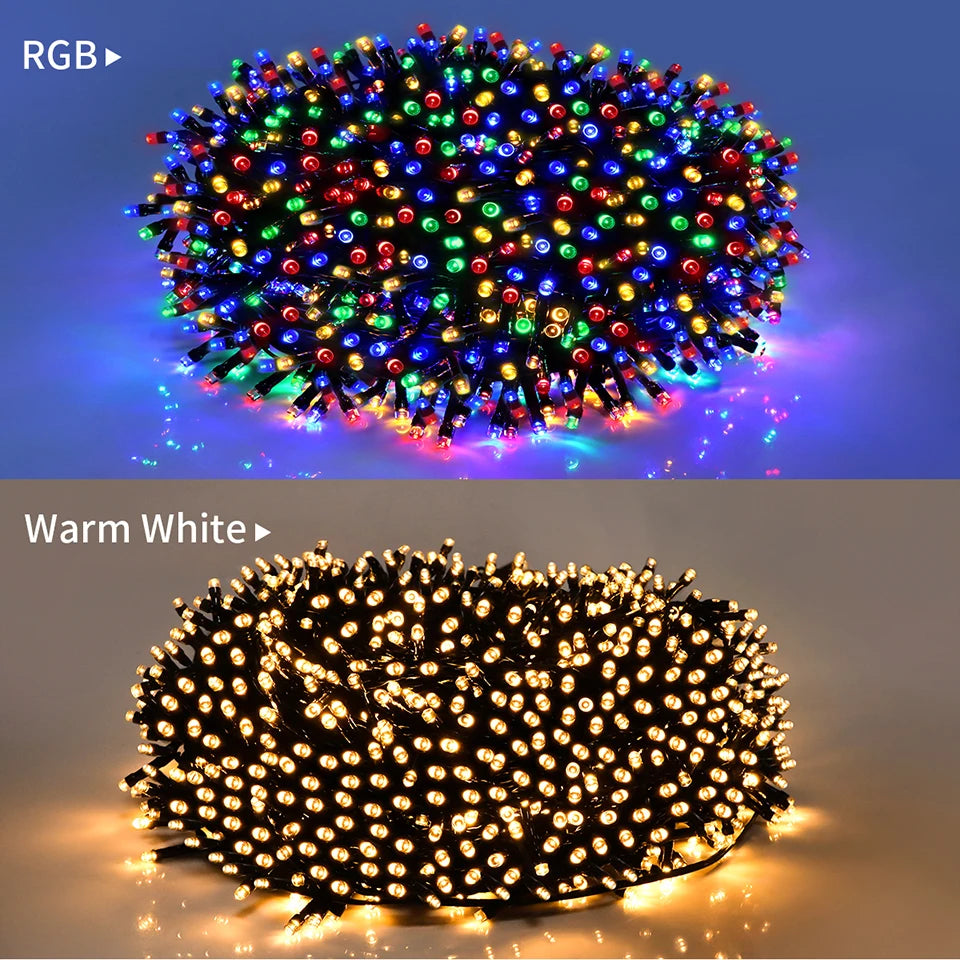 A close-up view of solar powered LED string lights with multicolored bulbs illuminating a dark background.