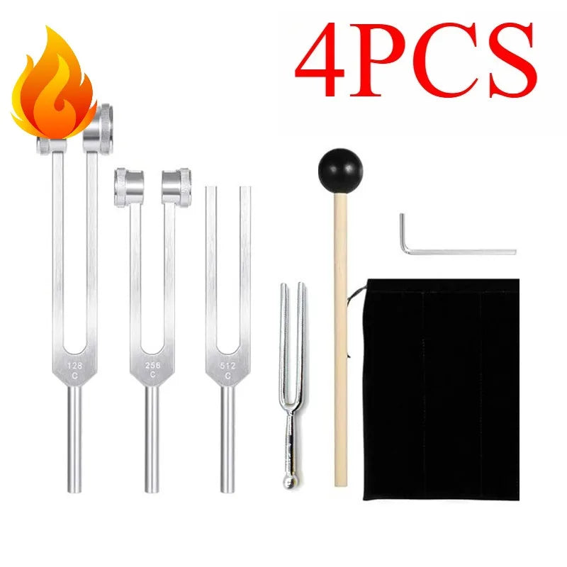 A set of four metal tuning forks with activators, including a flame graphic and a black storage pouch.