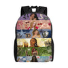 A black canvas daypack backpack featuring various artistic designs and faces on its surface.