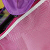 A pink mesh organizer for a stroller, featuring purple fabric and white trim.
