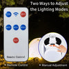 A remote control for a foldable solar camping lantern showing options for on/off and three lighting modes, next to a hand adj