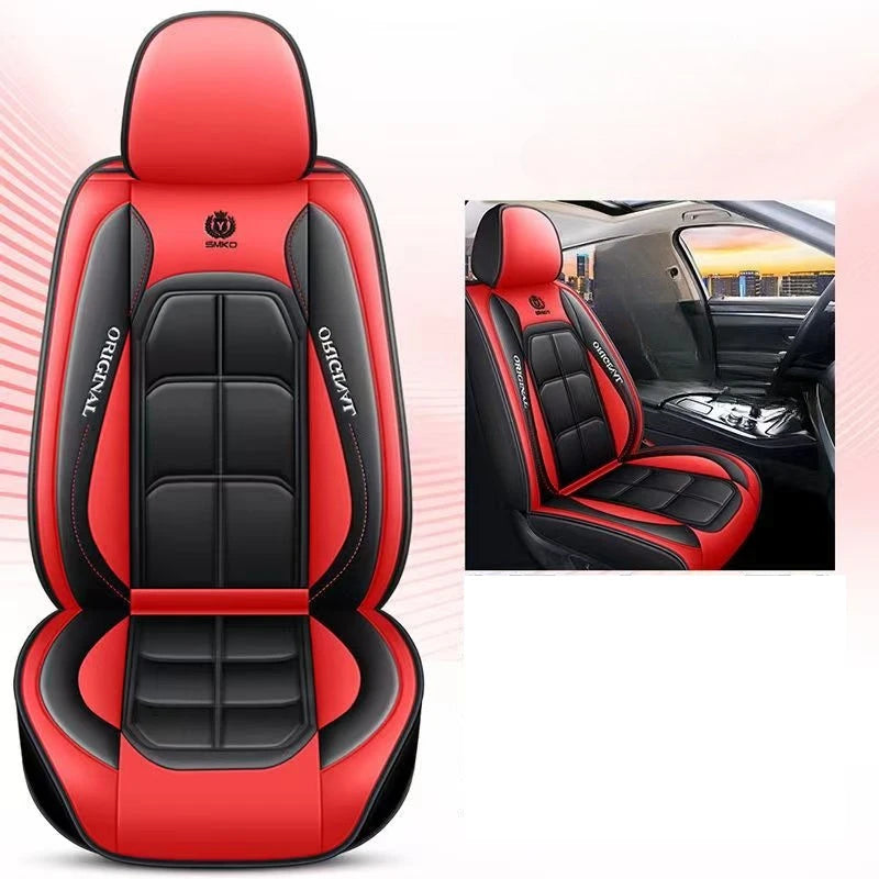 A red and black universal car seat cover for a vehicle interior, shown in a close-up view.