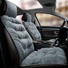 Gray plush car seat covers with backrest support installed in a vehicle interior.