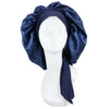 A navy blue satin sleep cap draped over a white mannequin head.
