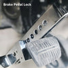 Close-up of a heavy-duty stainless steel brake pedal lock with multiple holes and a textured grip.