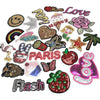 A collection of 30 assorted embroidered iron-on patches featuring various designs like hearts, flowers, and food items.