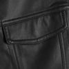 Close-up of a black faux leather biker vest showing stitching and a flap pocket detail.