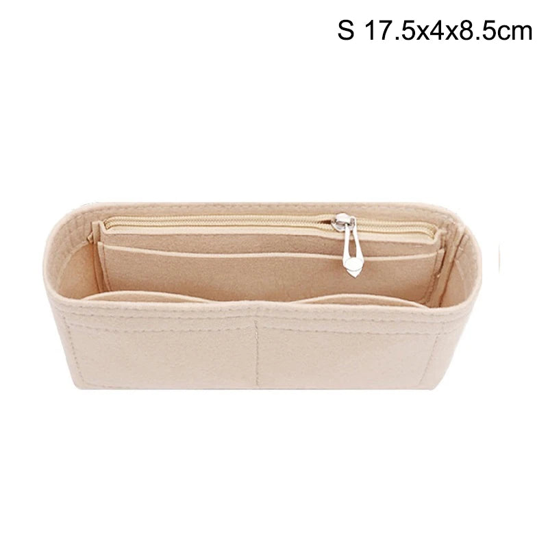 A light beige felt bag organizer with a zippered compartment and multiple pockets.