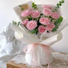 Pink roses wrapped in white organza ribbon for DIY crafts and gift wrapping