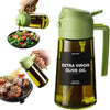 A dark green glass bottle of extra virgin olive oil dispenser and sprayer with a green cap and pump.