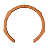 A brown perforated leather steering wheel cover with a red accent ring.