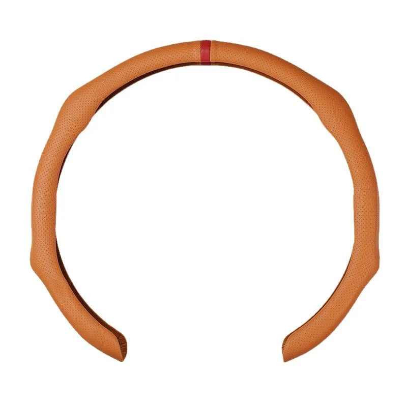 A brown perforated leather steering wheel cover with a red accent ring.
