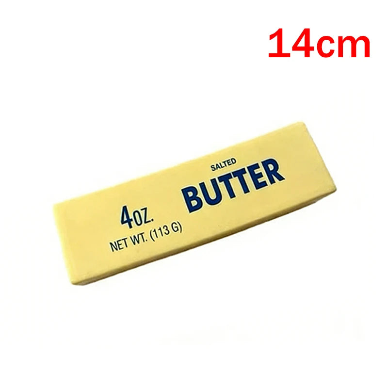 A yellow salted butter fidget stick measuring 14cm long.