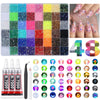 A grid of mixed color acrylic rhinestone flatbacks for craft decoration, showing various shades and sizes.