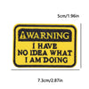 Yellow embroidered iron-on patch with black text warning I have no idea what I am doing