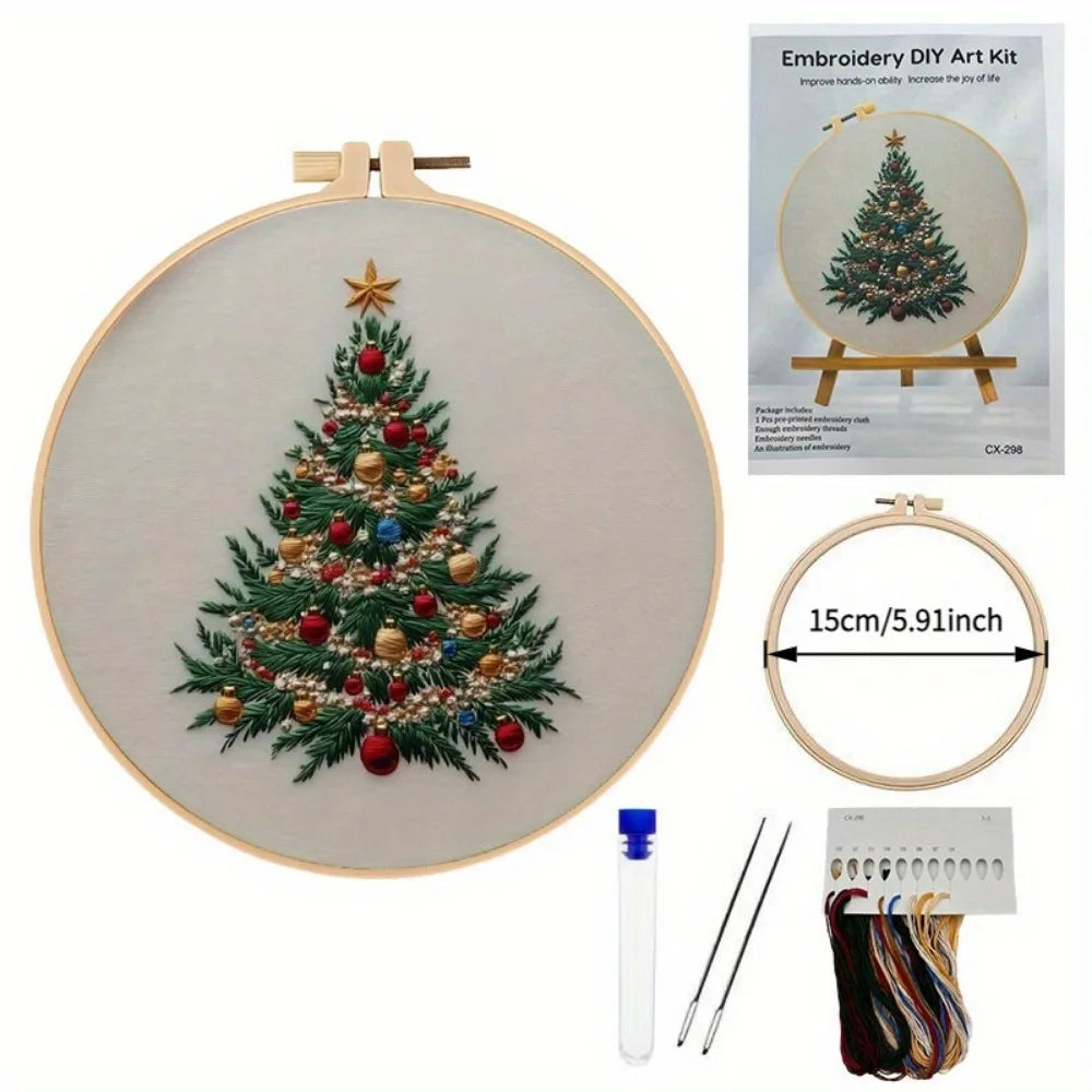 Embroidery DIY Art Kit featuring a handcrafted Christmas tree design on a canvas with tools and thread.