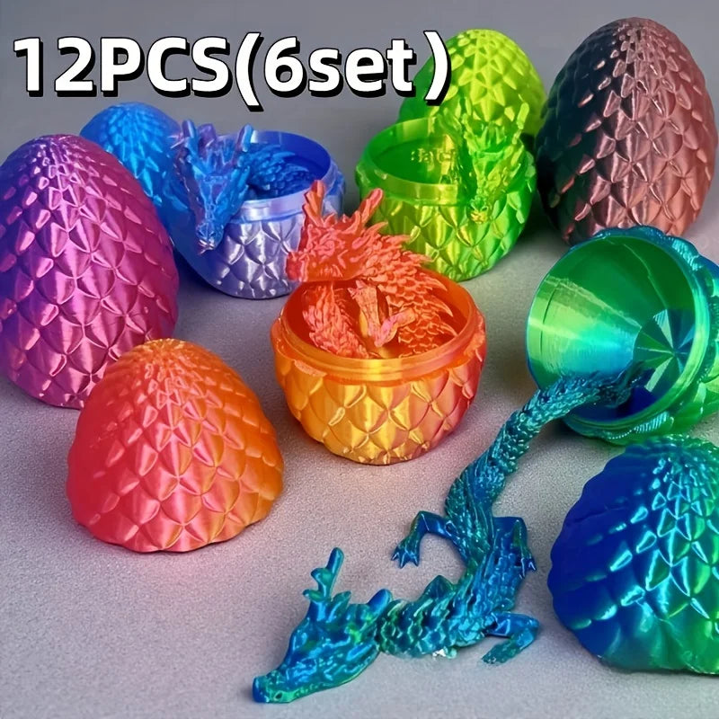 A set of twelve 3D printed dragon and egg sculptures in various colors including pink, green, purple, orange, and blue.