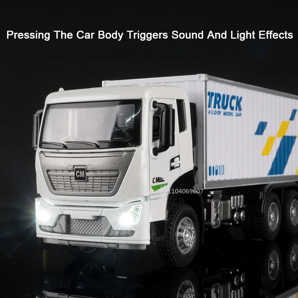 A white diecast model truck triggers sound and light effects, featuring a cab and cargo box.