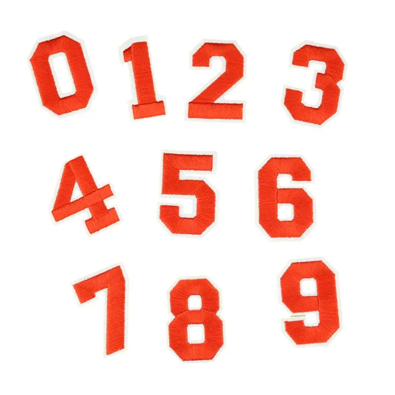 A set of iron-on 3D number patches for clothing, numbered 0 through 9 in orange fabric.