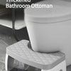 A white thickened bathroom ottoman, a non-slip toilet pad, is shown in a side view.