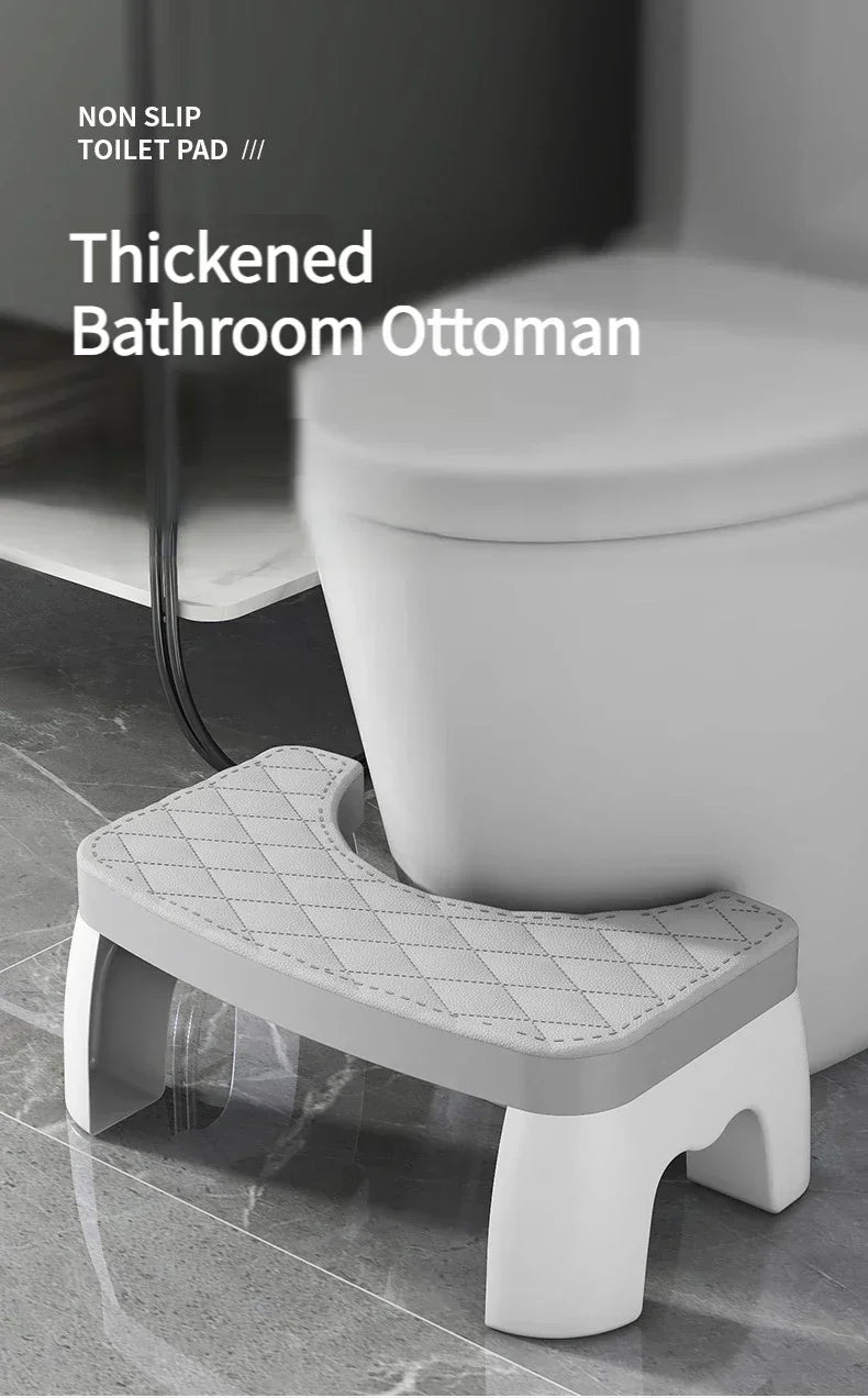 A white thickened bathroom ottoman, a non-slip toilet pad, is shown in a side view.