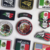 A collection of tactical patches featuring Mexican flag designs, including an eagle skull and various national symbols.