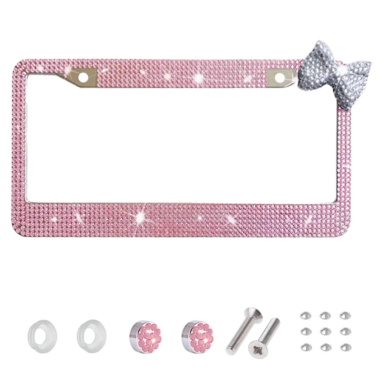Pink rhinestone license plate frame with a silver accent bow and mounting hardware
