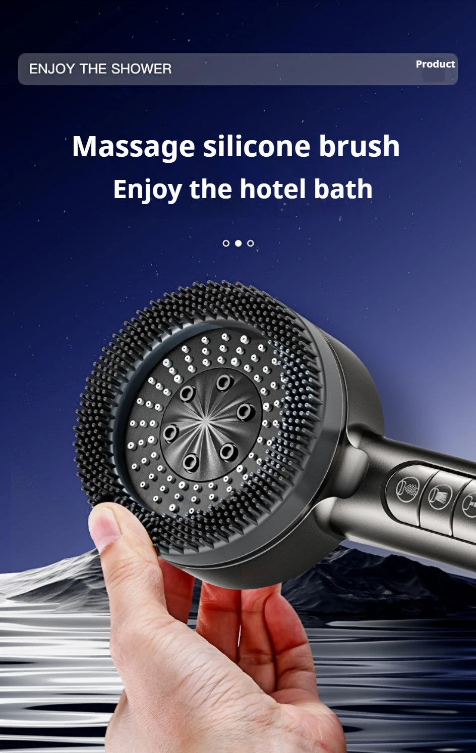A hand holds a black massage silicone brush shower head against a dark blue background.