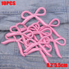 Ten pink embroidered cartoon bow iron-on patches for DIY clothing decoration