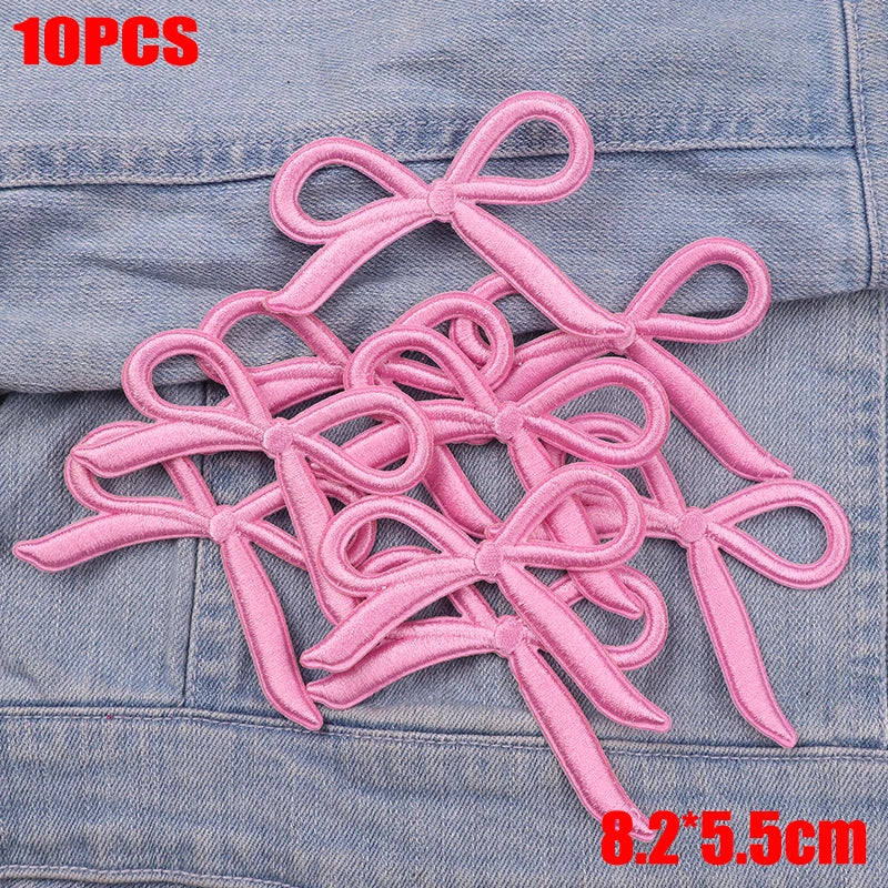 Ten pink embroidered cartoon bow iron-on patches for DIY clothing decoration