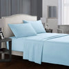 A light blue bedding set featuring a fitted sheet, flat sheet, and pillowcases on a bed in a modern bedroom.