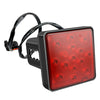 A universal 12V LED trailer tail light with brake and running functions featuring a red lens and wiring.