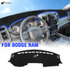 Black custom fit dash cover for a Dodge Ram vehicle interior.