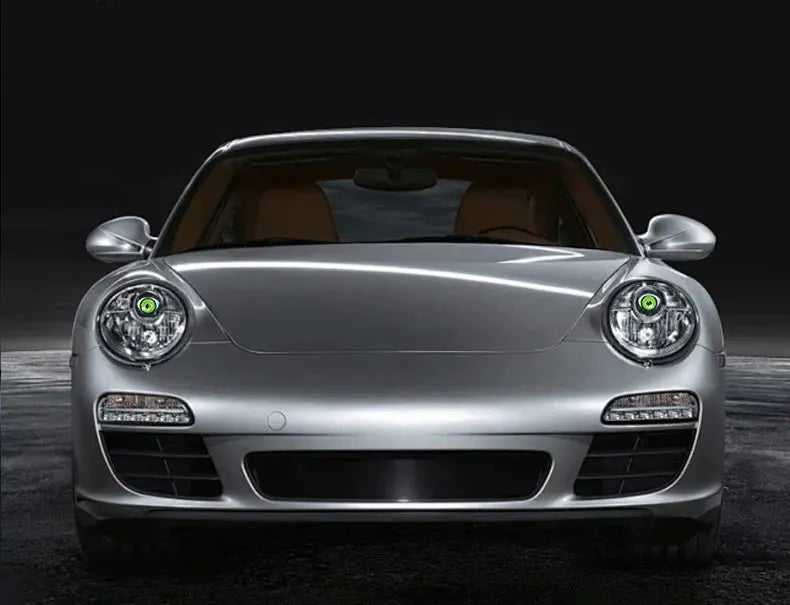 Front view of a silver Porsche with dynamic devil eye LED headlights.