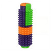 A stack of five colorful spiked fidget rollers in orange, purple, and green.
